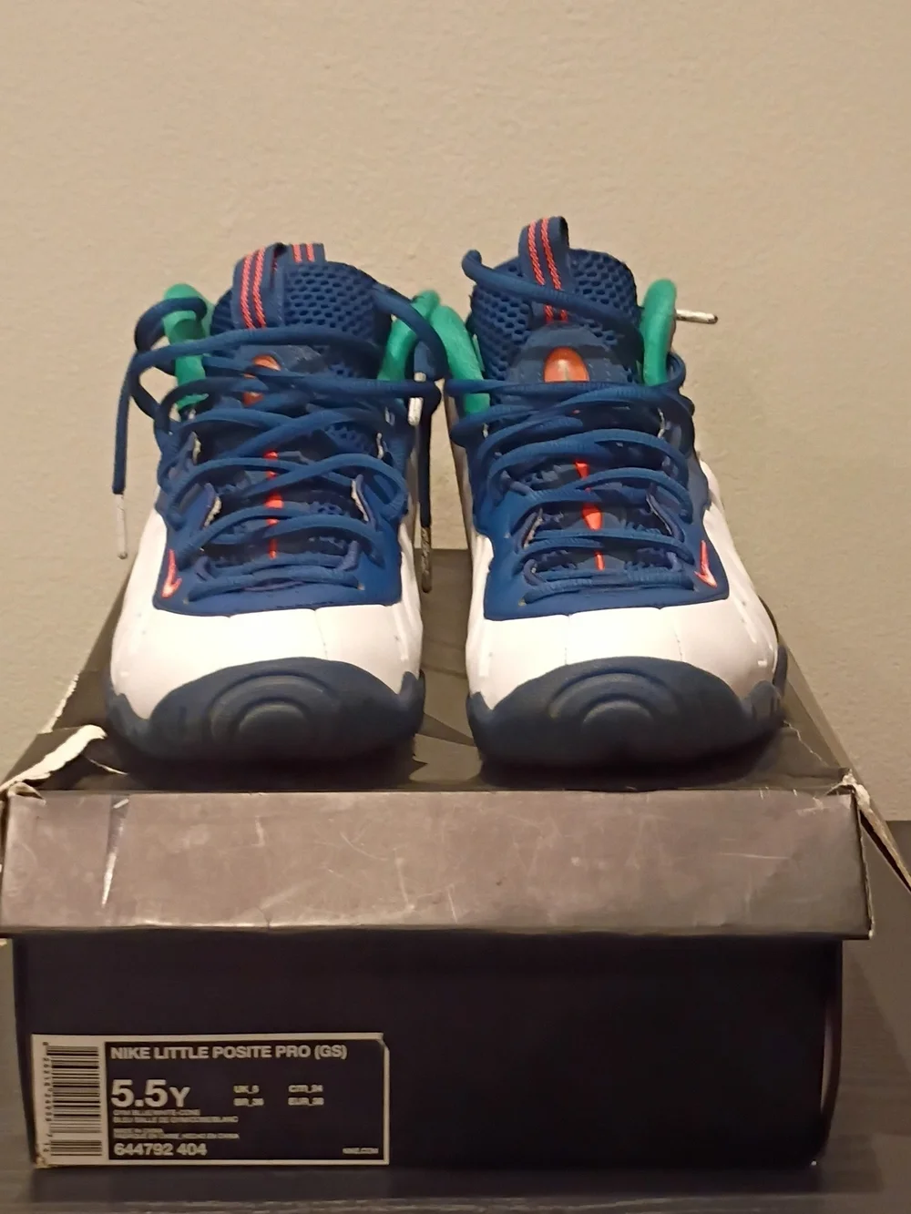 Nike Kids White and Blue Sneakers with Green and Orange Accents